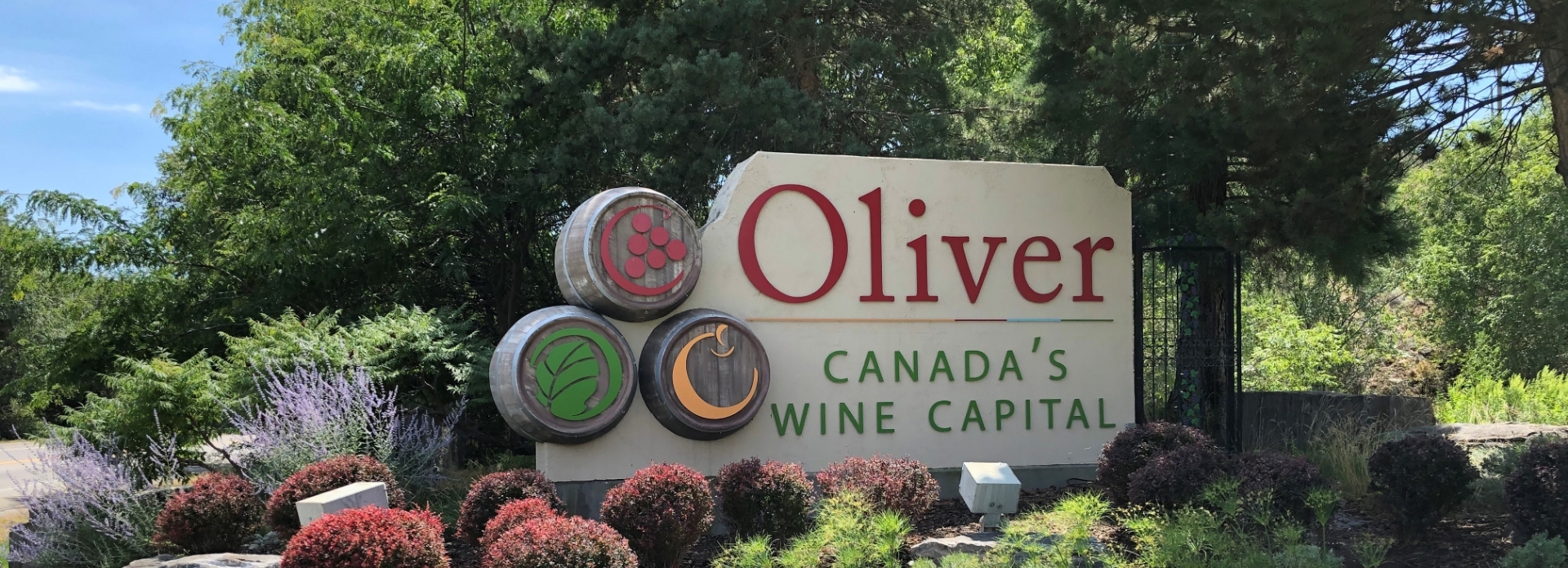 Town sign that says "Oliver, Canada's Wine Capital'