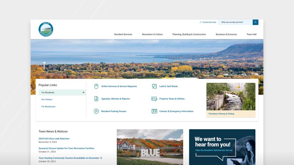 A screenshot of the Town of The Blue Mountains homepage, with a large image banner of Georgian Bay.