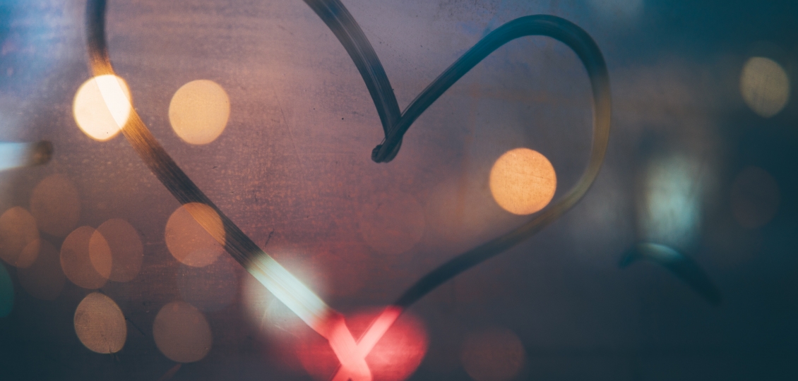 Heart on windowpane