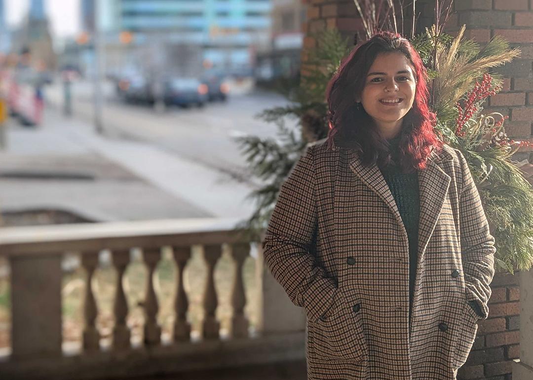 Gio standing on a porch