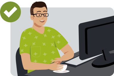 Happy person sitting in front of their computer